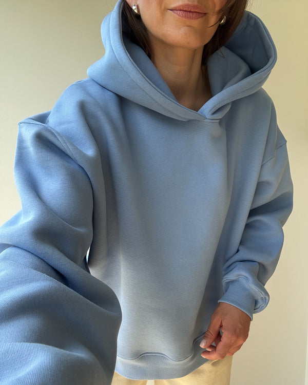Stylowa bluza damska z kapturem w pastelowym odcieniu
